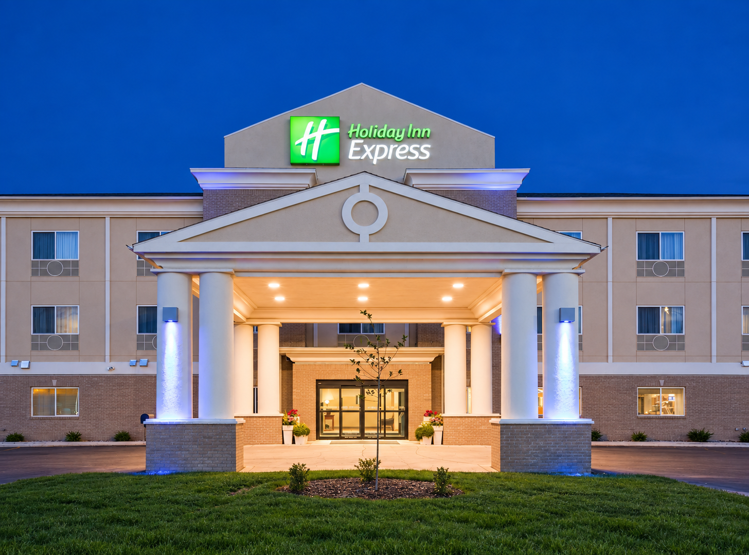Holiday Inn Express Devils Lake exterior at dusk